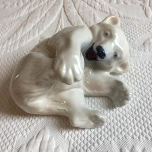 Vintage Royal Copenhagen Porcelain Polar Bear Number 729. Laying Playful White Polar Bear Figurine.