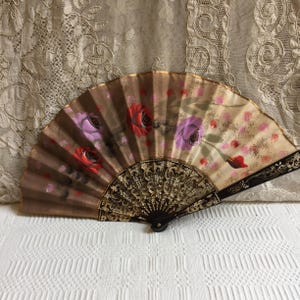Vintage Double Painted Fabric Rose Hand Fan. Black and Gold Openwork Plastic Sticks and End Pieces. Lovely Fan for Modern Use or Costuming.