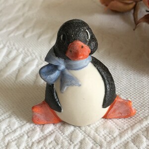 Vintage Porcelain Penguin with Blue Neck Bow. Charming Little Figurine for a Miniature Display.