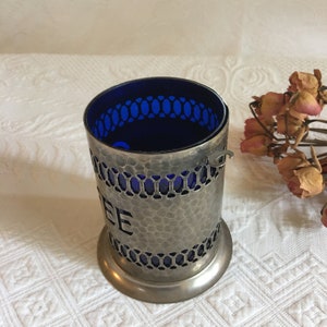 Vintage Coffee Container. Hammered Silver Plate Openwork Design w/ Lid and Spoon. Cobalt Blue Hard Plastic Liner and Spoon Holder. image 10