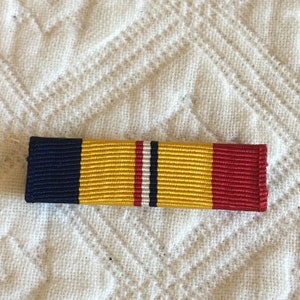 Vintage MC Combat Action. Marine Corps Accessories. Combat Action Medal Ribbon R817. Listing for 1 Piece. Slide Bar Backing.