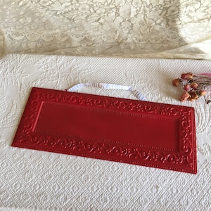Red Painted Metal Sign. Paint or Mark Temporarily a Message on This Sign. Molded Border Swirling Designs.