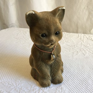 Vintage Cat Bank. Light Weight Flocked Kitty Cat with Bell at Neck. Robin Mfg., Inc. Markesan, Wis. Cover on Bottom.