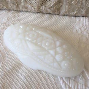 Vintage Milk Glass Oval Dish with Cut Glass Look Designs on the Bottom. Great for a Candy Dish or on the Dresser for Jewelry.