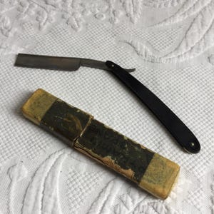 Antique Straight Razor. Geneva Cutlery Co, Geneva, N.Y. Black Celluloid Straight Razor for Shaving.