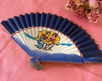 Antique Hand Painted Fan. Blue Cotton Leaves With Painted Sticks. Sailor and Girl at a Table Design. Gold Trimmed Navy Blue Leaves. Spain.