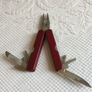 Vintage Folding Pliers and Pocket Knife in One. Red Case and Fold Away Tools. Easy to Carry Around.