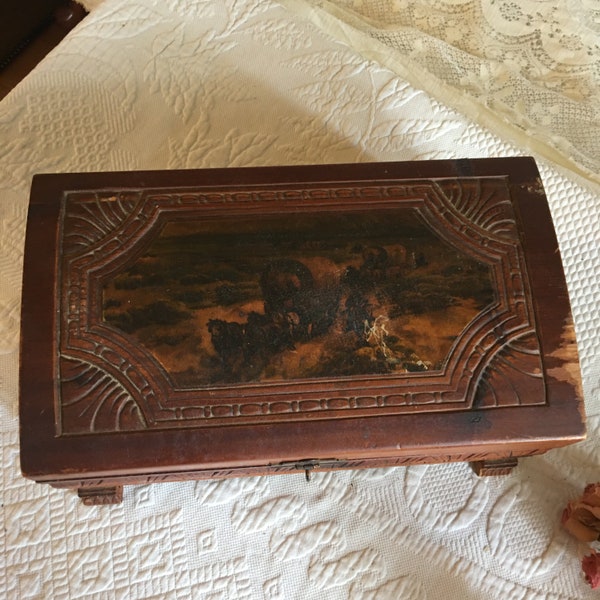 Vintage Cedar Chest Keeper Etched Carved Chest With Picture of Stage Coaches. Four Feet on the Bottom. Floral Designed Mirror Inside.