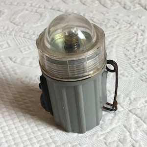 Vintage D-31 USAF/USN Survival Beacon Flashlight on a Pin. Militaria Fighter Pilot Parachute Rescue Light. Great for Vintage Display.