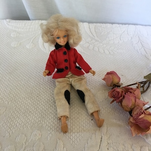 Vintage Small Barbie Style Doll With Riding Habit. Blonde Hair, Blue Eyes, Bendable Knees, Rolling Shoulders.
