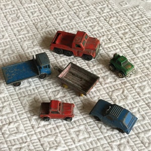 Vintage Metal Toy Vehicles. Matchbox No60 Site Truck England, Superfast No19 Cement Truck, Tootsie Toy Rabbit, 87 Roadchamp and Util. Cart.