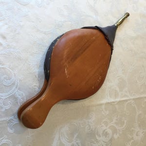 Vintage Orvis Carved Wood Bellows With Brass Nossal. Faux Leather Sides with Hobnail Construction. Charming Display Piece.