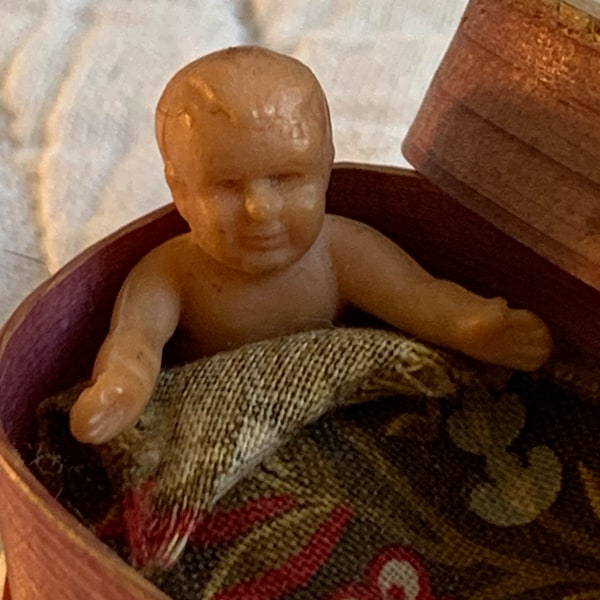 Vintage Tiny Miniature Baby in Oval Wooden Box Bed. Great for Miniature Display or for Doll House. Padding and Fabric for Bedding.