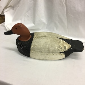 Vintage Wood Duck Decoy to Float in Water. Painted Wood Vintage Duck Decoy. Textured Back Feathers. Usable. Glass Eye Belonged to RH O&#39;Neal.