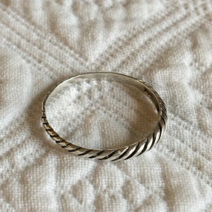 Vintage Narrow Rope Style Sterling Silver Band. Marked Sterling. Twisted Rope Design on Band.