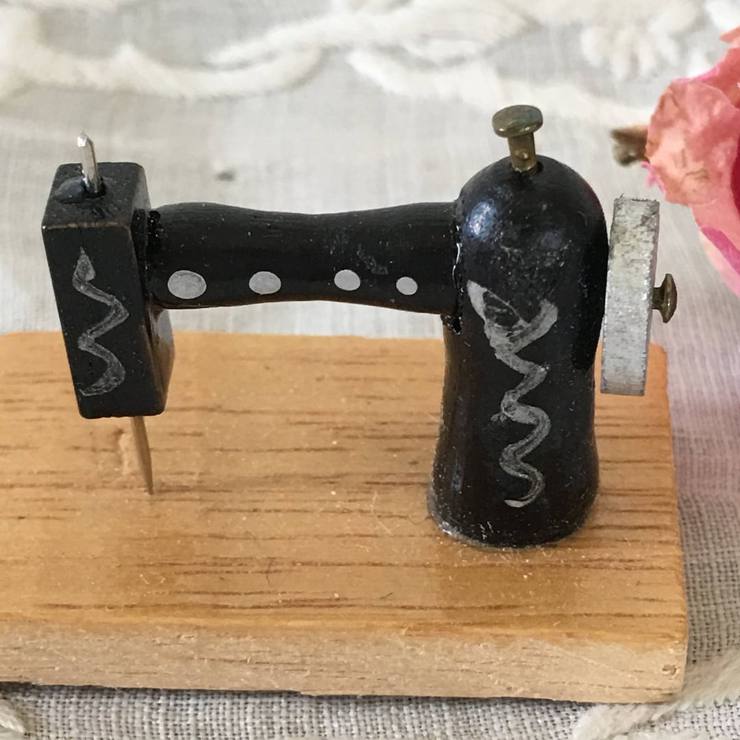 Vintage Miniature Sewing Machine. Wood Base With Black and Silver