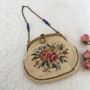 Antique Silk Pettit Point Floral Purse. Gold Swirling Designs on Frame With Laurel Wreath Ornament. Push Button Release. Fish Chain Holders.