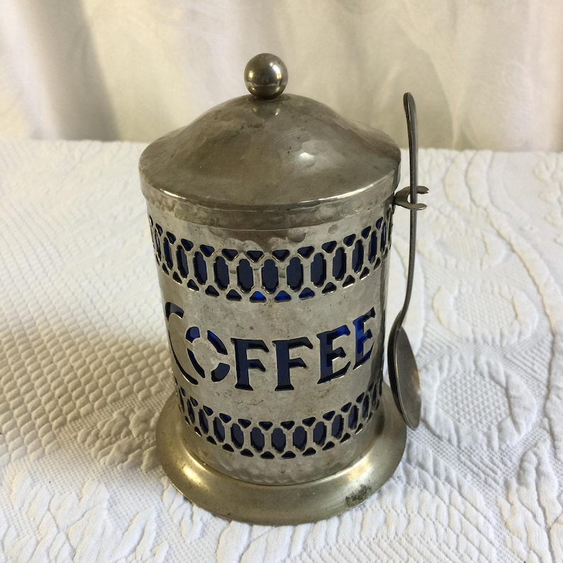 Vintage Coffee Container. Hammered Silver Plate Openwork Design w/ Lid and Spoon. Cobalt Blue Hard Plastic Liner and Spoon Holder. image 6