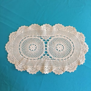 Vintage Crocheted Oval Ecru Colored Table Topper Mat. Double Circle Center Design and Inclusive Border. Centerpiece Doily.