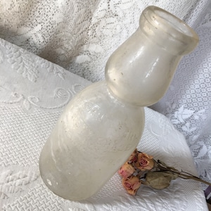 Vintage Chestnut Farms Washington DC Milk Bottle. Unique Shaped Milk Bottle and Says, Safe Milk for Babies. On Bottom It Says, Cream Top.