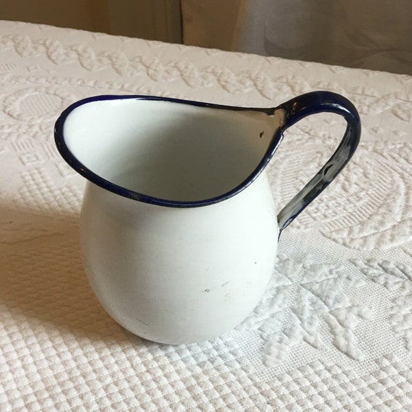 Vintage Enamelware Pitcher. Small White and Blue Enamelware Cream Pitcher. 4 7/8" Tall Pitcher.