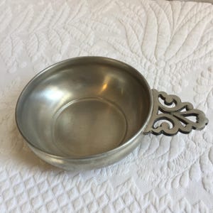 Vintage Porringer. Williamsburg Style International Pewter 277 791 Pewter Porringer. 1 3/4&quot; Deep with Handle on One Side.