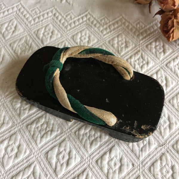 Vintage Japanese Wooden Sandal. It Could Be a Childs Sandal or a Woman's With Small Feet. Fabric and Leather Around Foot. Black Painted.