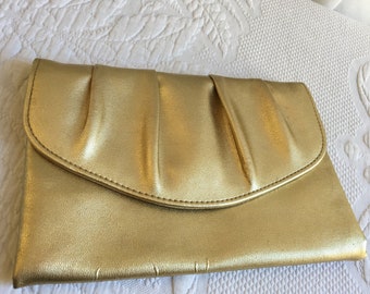 Vintage Gold Metallic Clutch Purse. Front Snap Closure. Grosgrain Lining.