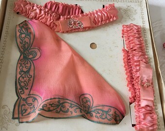 Vintage Set of Coral Garters and Hanky. Beautiful Boxed Set of Bright Coral Handkerchief and Two Garters With Lovely Lady on Box.