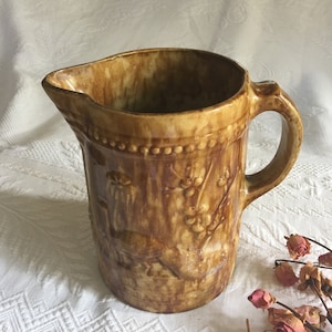 Antique Yellow Ware Pitcher With Peacock, Tree and Floral Designs. Crackling Finish From Age. Hobnail Design Borders. Wonderful Old Pitcher.