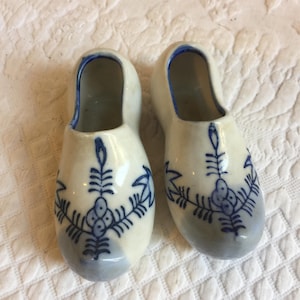 Vintage Porcelain Holland Shoes Figurine. Made in Japan. Blue and White with Floral Painted Designs. Great Little Trinket Holders.