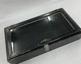 Vintage Black Painted Showcase with Hinge for Padlock, Lay Back Glass Top and Handle for Opening. Display Case w/ Black Felt Bottom Lining.