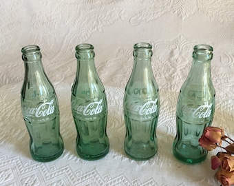 Vintage Coca Cola Single Empty Bottle, Condition, Clear Green Glass. Choose: Montgomery AL, Marion SC, Buffalo New York or Laconia NH.