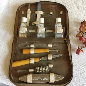 Vintage Nail Care Kit in Zippered Case. Ann Barton 3 Cuticle Bottles, Celluloid Tools and Silver Plate Top on Buffer. 10 Pieces Included.