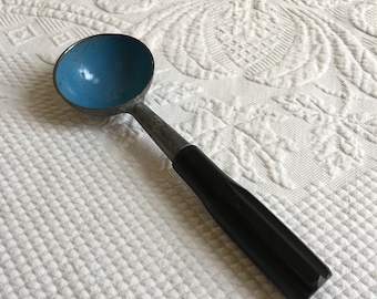 Vintage Ice Cream Scoop. Blue Enamel Interior in Darkened Silver with Black Handled Round Ice Cream Scoop.