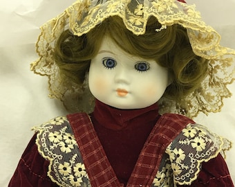 Vintage Musical Zasan Porcelain Doll. Choose Red Velveteen Dress