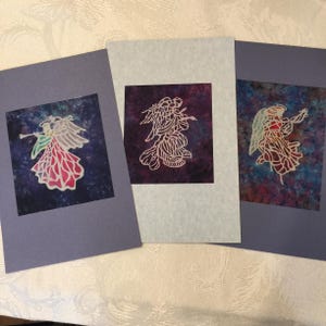 8 Blank Note Cards with Angel Designs. Assortment of Angel Design Cards. Envelope is Included for Each.