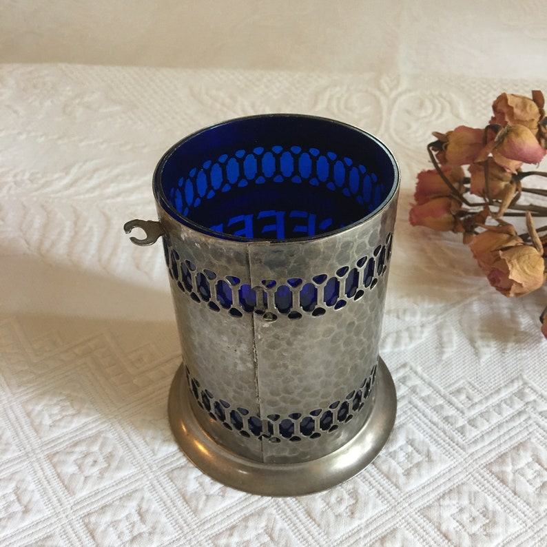 Vintage Coffee Container. Hammered Silver Plate Openwork Design w/ Lid and Spoon. Cobalt Blue Hard Plastic Liner and Spoon Holder. image 11
