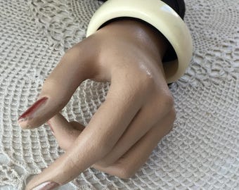 Vintage Cream Lucite Swirling Bangle Bracelet. 8 1/4" X 7/8" Wide Slightly Swirling Bracelet.