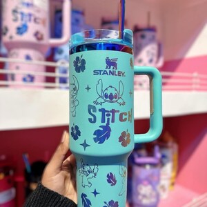 May include: A handmade wooden sign with the text "Welcome to our home" in a handwritten style. The sign is painted white with a dark stained frame. The sign measures approximately 12 inches wide and 8 inches tall.