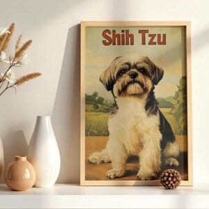 May include: A framed rectangular wall art print featuring a brown, black, and white Shih Tzu dog sitting in a field. The text "Shih Tzu" is printed in large brown letters at the top of the print. The artwork is displayed in a light wood frame.