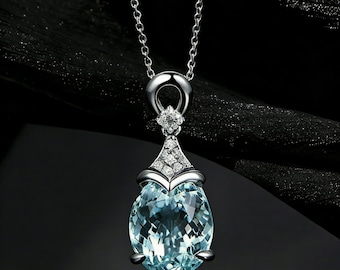 Elegant Teardrop Aquamarine Pendant Necklace in Sterling Silver with Diamond Accents