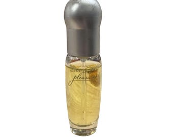 Perfume vintage Estée Lauder Pleasures, frasco miniatura de tamaño viaje.