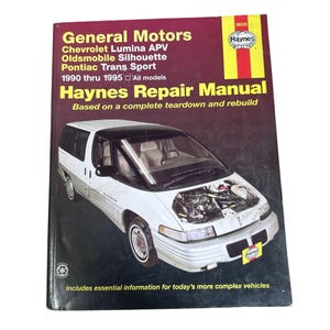 May include: A Haynes Repair Manual for General Motors vehicles, including Chevrolet Lumina APV, Oldsmobile Silhouette, and Pontiac Trans Sport models from 1990 to 1995. The cover features a white minivan with its hood open, showcasing the engine.