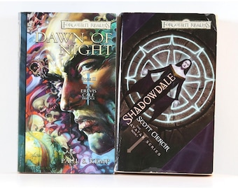 May include: Two fantasy novels, "Dawn of Night" and "Shadowdale," from the "Forgotten Realms" series. "Dawn of Night" features a detailed portrait and the author's name, Paul S. Kemp. "Shadowdale" has a woman in a cloak and the author's name, Scott Ciencin.