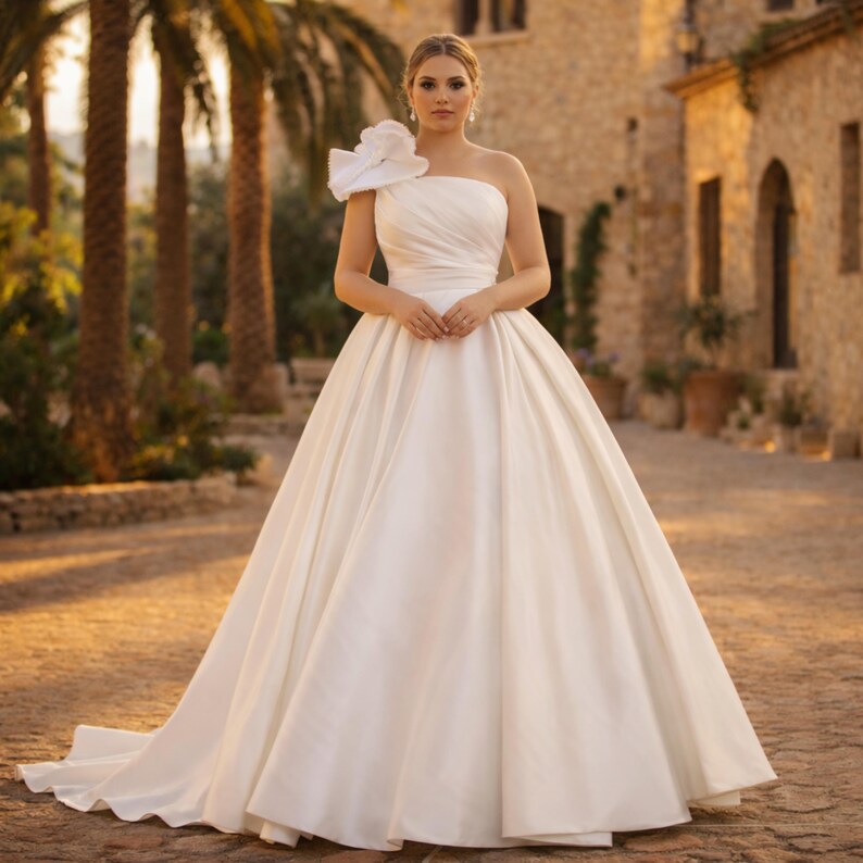 Plus Size Satin A-line Wedding Dress, One Shoulder Floral Bridal Gown, Elegant Minimalist
Plus Size Sparkly Boho Wedding Dress – Off Shoulder Lace Bridal Gown with Open Back | Romantic Beach & Outdoor Wedding Dress