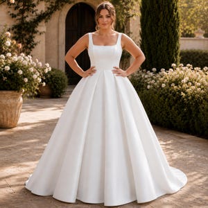 Plus Size Satin Wedding Dress, Square Neck Ballgown, Minimalist Bridal Gown, Elegant Reception Ceremony
Plus Curvy Bridal Gown, Lace Bohemian, Rustic Elegant Long sleeve, Slit A-line Wedding Dress
Plus Size Sparkly Boho Wedding Dress, Lace Bridal Gown with Open Back | Romantic Beach & Outdoor Wedding Dress