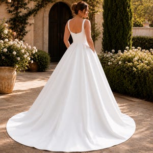 Plus Size Satin Wedding Dress, Square Neck Ballgown, Minimalist Bridal Gown, Elegant Reception Ceremony
Plus Curvy Bridal Gown, Lace Bohemian, Rustic Elegant Long sleeve, Slit A-line Wedding Dress
Plus Size Sparkly Boho Wedding Dress, Lace Bridal Gown with Open Back | Romantic Beach & Outdoor Wedding Dress