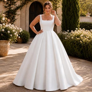 Plus Size Satin Wedding Dress, Square Neck Ballgown, Minimalist Bridal Gown, Elegant Reception Ceremony
Plus Curvy Bridal Gown, Lace Bohemian, Rustic Elegant Long sleeve, Slit A-line Wedding Dress
Plus Size Sparkly Boho Wedding Dress, Lace Bridal Gown with Open Back | Romantic Beach & Outdoor Wedding Dress