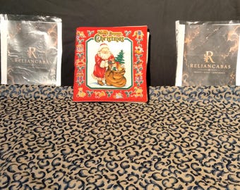 Step back into the cozy holidays of the past with this delightful vintage cloth edition of the timeless classic, "The Night Before Christmas